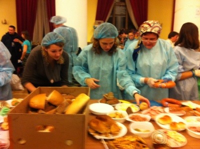 Grub's up! Scrubbed up and serving food. The main chamber also now houses a buffet