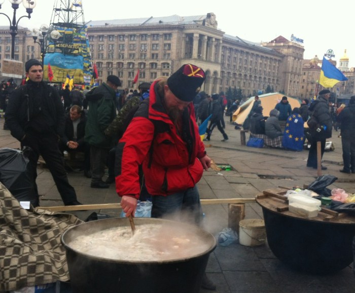 A soup tureen is stirred in the Independence Square  encampment