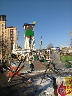 A watchtower has been erected overlooking a protesters' barricade in central Kyiv